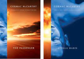 Off the shelf, Cover of Cormac McCarthy's two-volume set, The Passenger and Stella Maris," with the left half showing a dark orange sky with a view from above a large body of water which seems to be the ocean, with clouds in the middle of the cover, somewhat darker than the orange of the rest of the cover. On the right-hand side is the cover of Stella Maris, which shows what looks to be the bright orange cloud of a nuclear explosion on the left side with the right side showing what appears to be a dead woman lying with her eyes closed in smoky blue tones with what seem to be water drops on her.