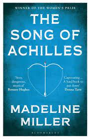 Off the shelf, Bloomsbury 2017 book cover for The Song of Achilles by Madeline Miller, with dark blue background and white writing showing Winner of the Women's Prize across the top followed by a centered title in all capital white letters with a bow and arrow shaped like a heart with the arrow pointing vertically upward with bright red blood on its tip and the author's name below, centered across the page, also in white all capital letters, all framed with a narrow white background