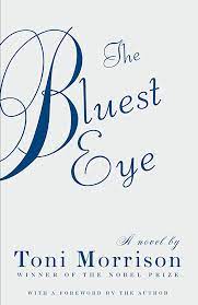 Book cover The Bluest Eye by Toni Morrison, white cover with script font, dark blue, with the title and the author's name