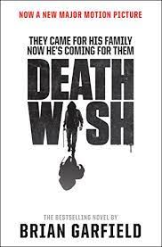 Book cover for movie tie-in edition of Death Wish by Brian Garfield, white cover with red capital letters along the top stating "Now a New Major Motion Picture," with text in black all capital letters below that, centered on the page, They Came for His Family Now He's Coming for Them, with the title centered on two lines Death Wish with the "I" in Death Wish composed of the figure of a man wearing a hoodie and carrying some sort of chain or other weapon, all on a white cover, with the author name Brian Garfield below