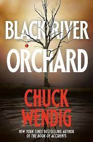 Book cover for Black River Orchard by Chuck Wendig, showing a bare apple tree with a single red apple dangling from one of the lower branches