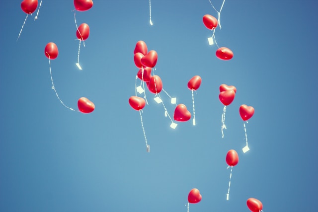 red heart balloons floating up into the sky
photo by Michael Schaffler on Unsplash