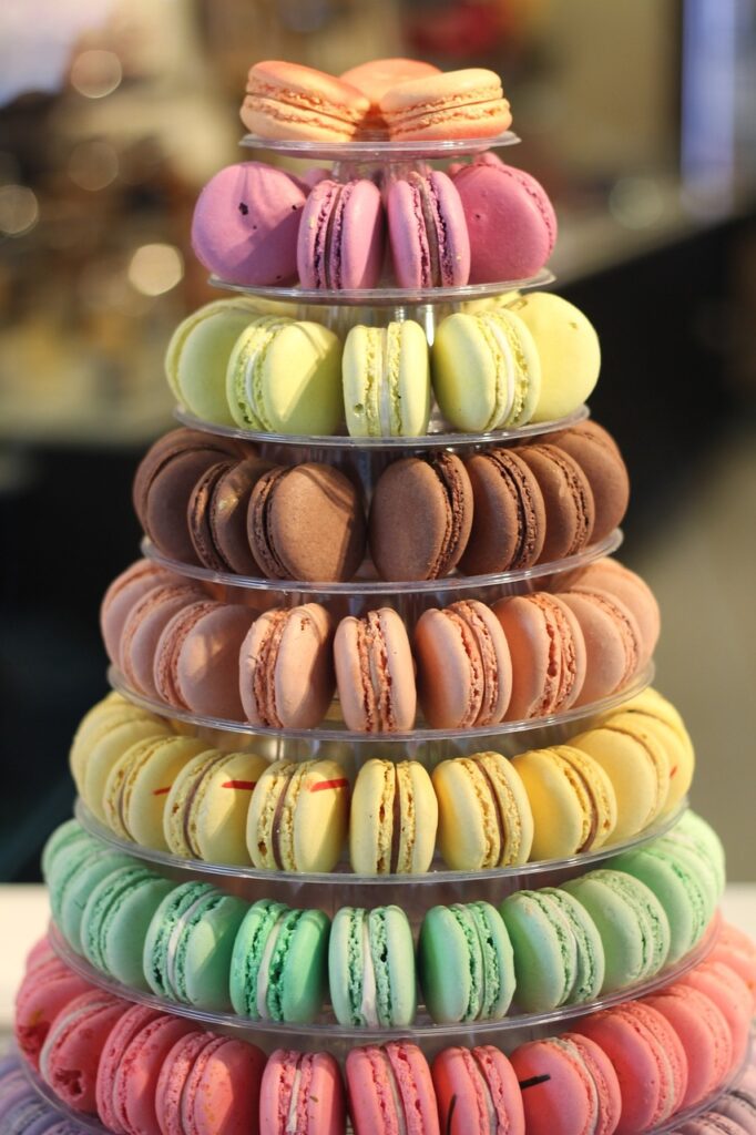 photo of tiered rack of colorful macaroon cookies photo by Tesa Robbins Pixabay