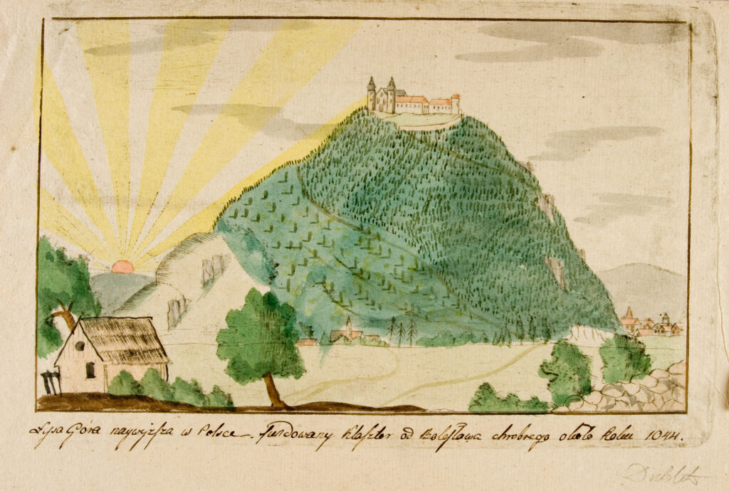 Old colored pencil drawing from the Krakow National Museum showing Lysa Gora (Łysa Góra), Bald Mountain, the only place in Poland from which you can see Warsaw and the Tatra Mountains. The drawing shows the sun coming up over the horizon on the left with a large green hill dominating the drawing, with a monastery situated across the top of the hill. In the foreground there is a simple house surrounded by a few green trees. In the background on the right is a small village.
